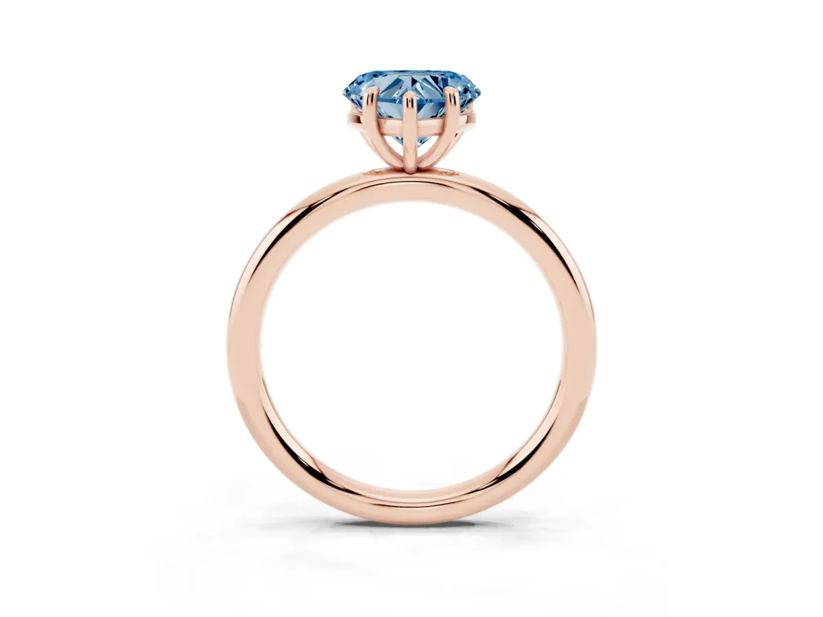 Fancy Blue Heart Cut Solitaire Diamond Ring with Four-Prong Setting on a Plain Band Rose gold