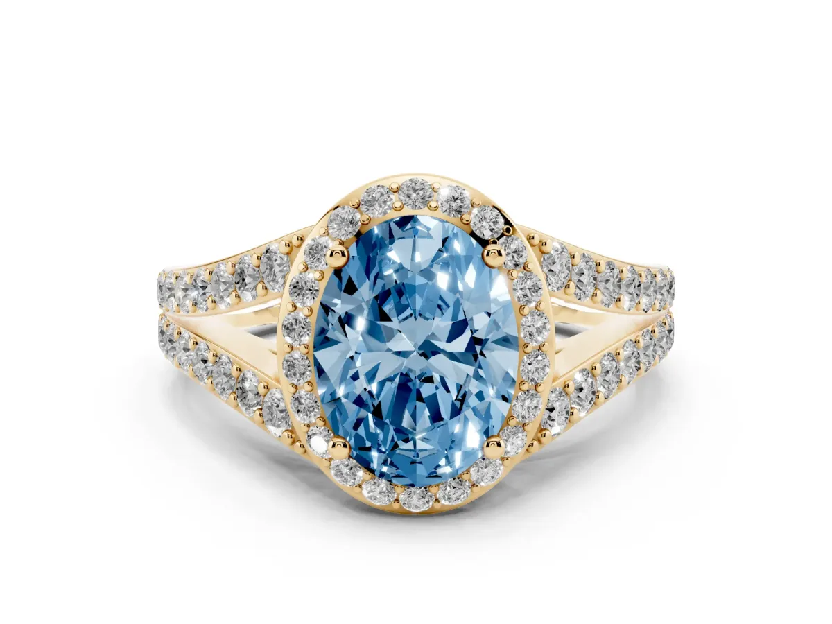 Fancy Blue Oval Cut Diamond Split Shank Halo Ring with Four-Prong Setting Yellow gold
