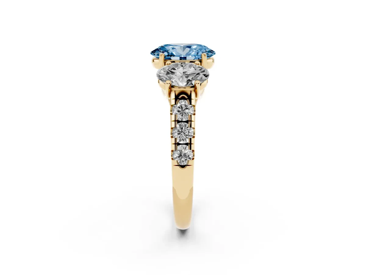 Fancy Blue Three-Stone Oval Cut Diamond Pavé Band with Prong Setting Yellow gold