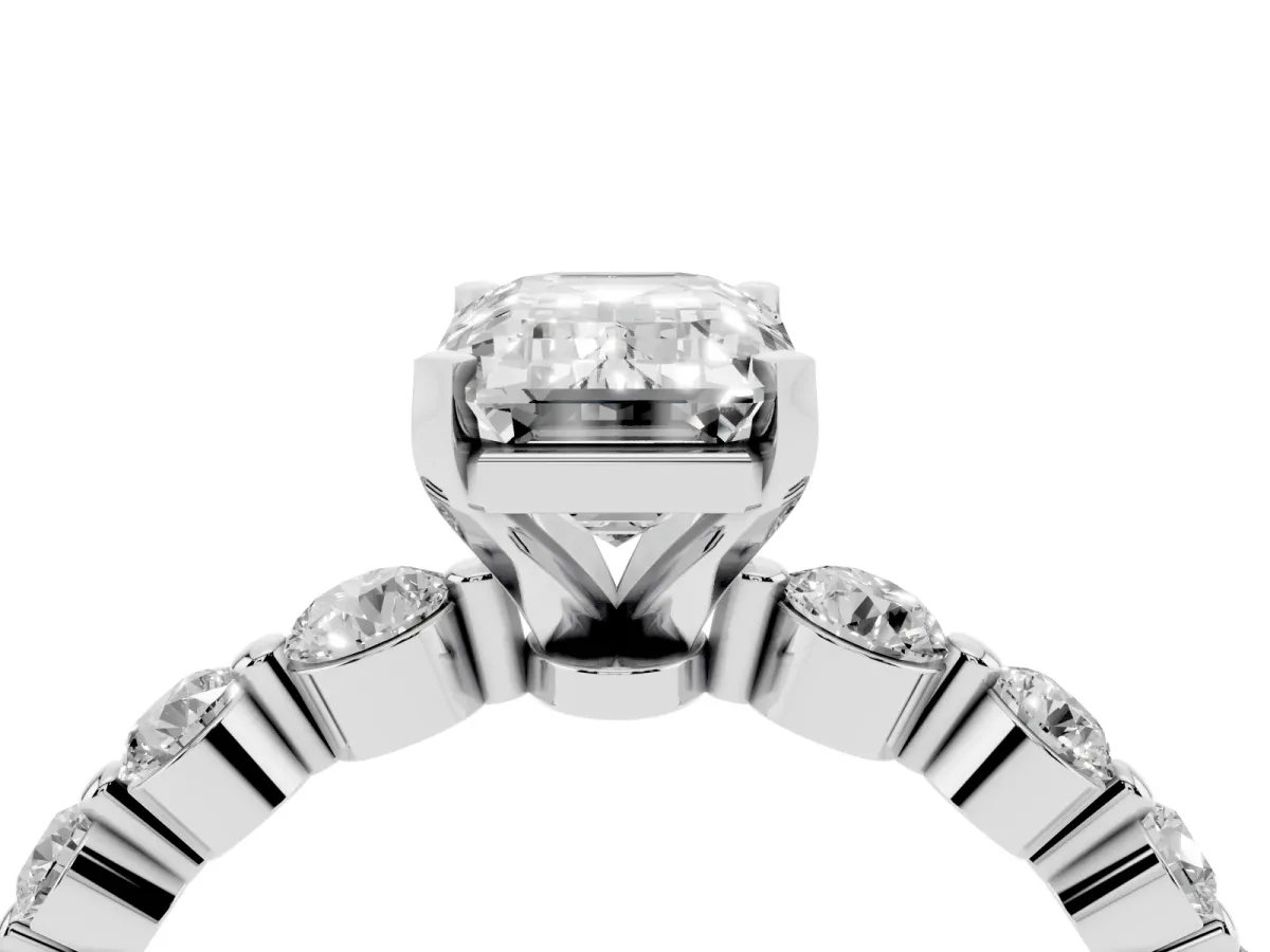 Emerald Cut Solitaire Diamond Ring with Pave Band and Four-Prong Setting Silver