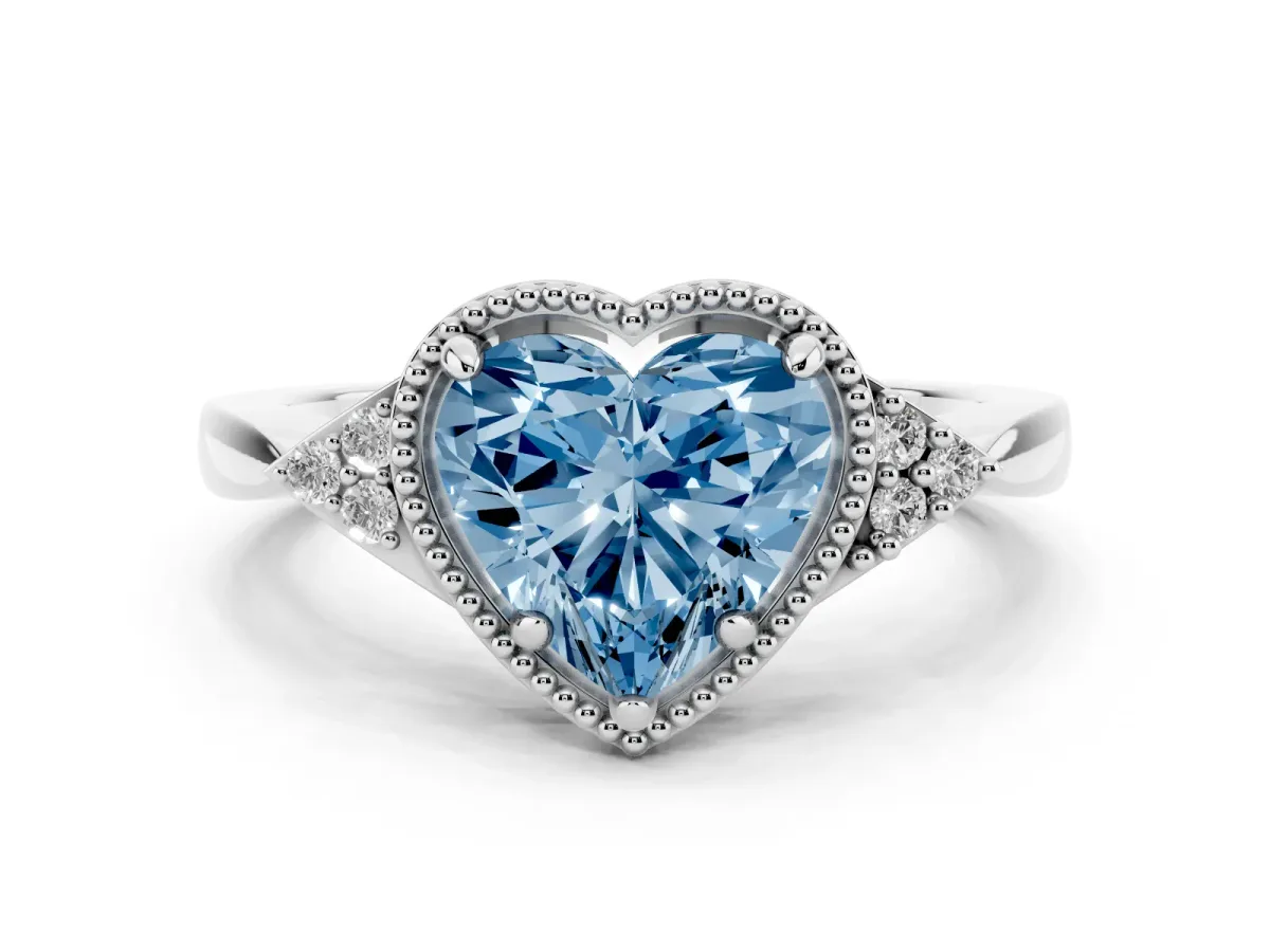 Fancy Blue Milgrain Heart Cut Cut Diamond Ring with Tapered Pave Band and Four Prong Setting Platinum