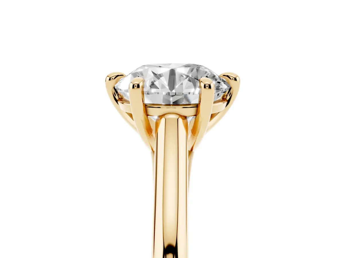Round Cut Solitaire Engagement Ring with Six-Prong Setting and Classic Band Yellow gold