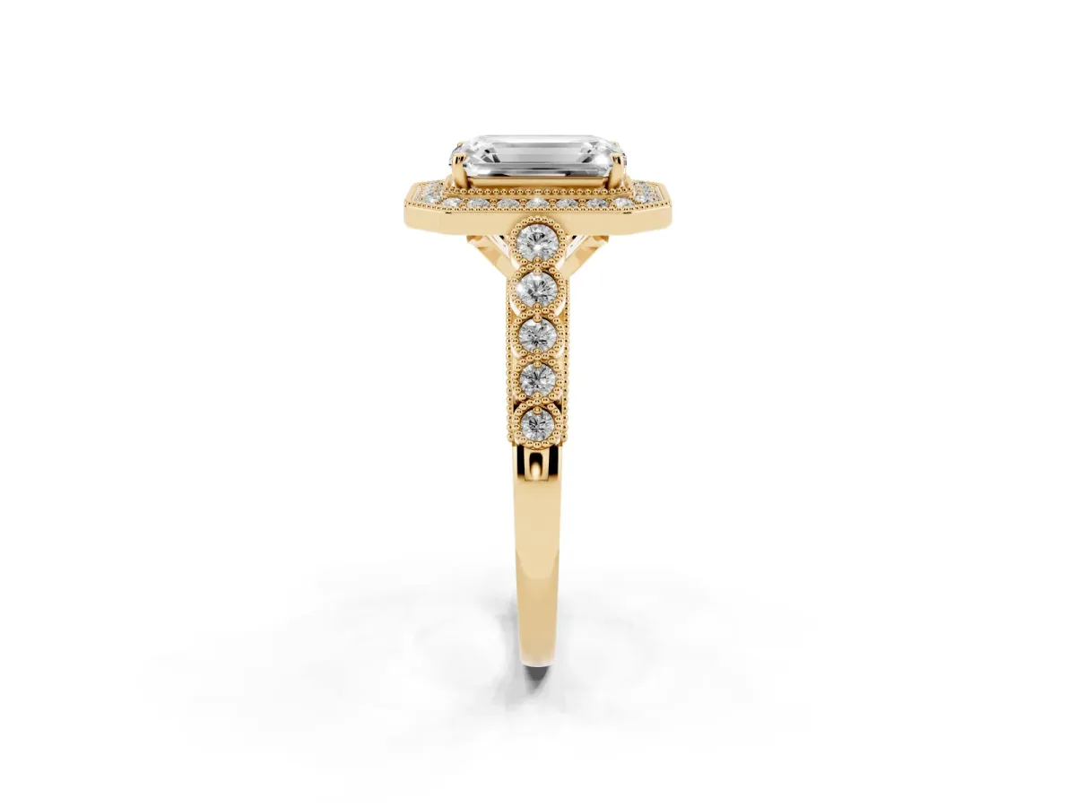 Emerald Cut Halo Milgrain Solitaire with Bezel Set Side Stones and Pave Band Yellow gold