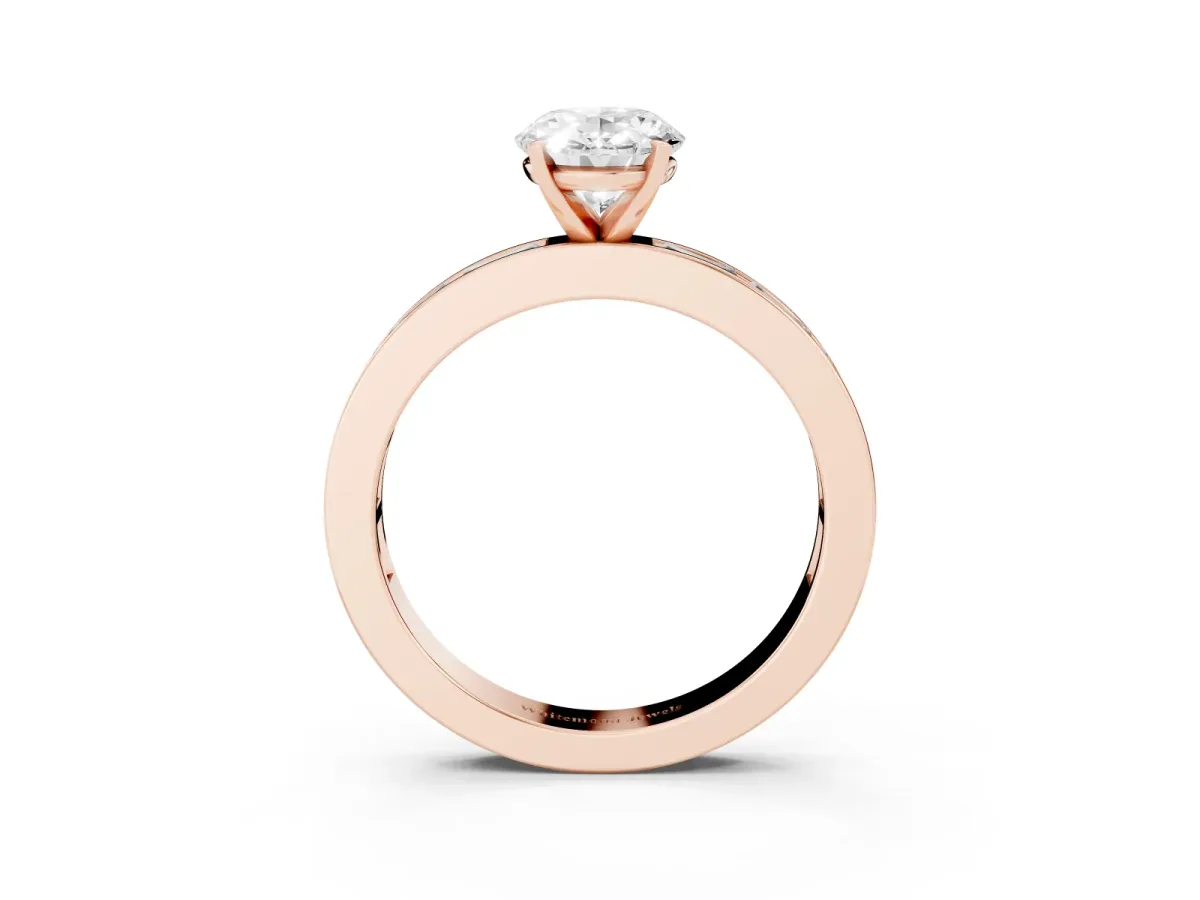 Oval Cut Solitaire Diamond Ring with Channel-Set Baguette Band and Four-Prong Setting Rose gold