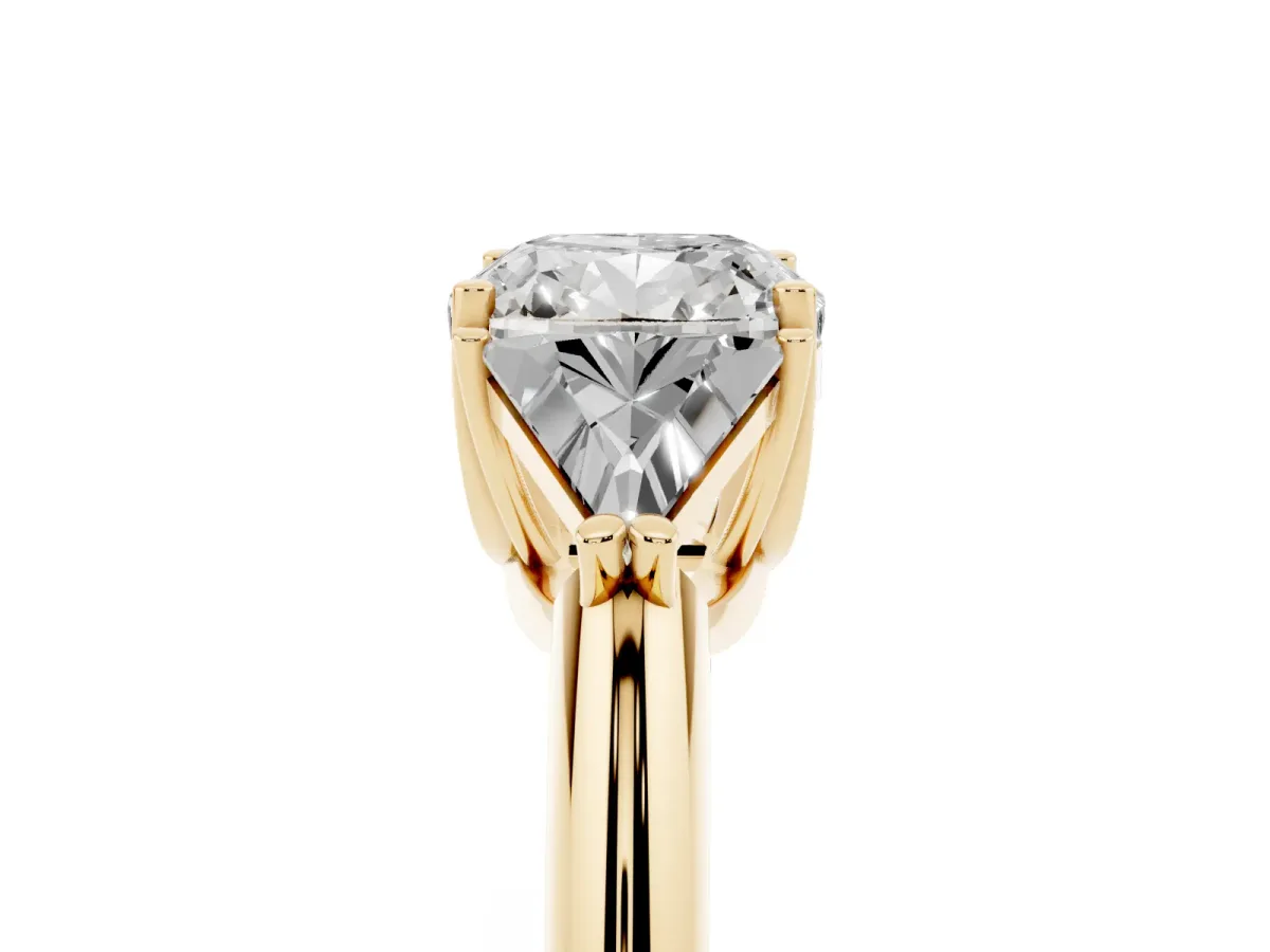 Three-Stone Cushion Cut Diamond Engagement Ring with Trillion Side Stones and Prong Setting Yellow gold