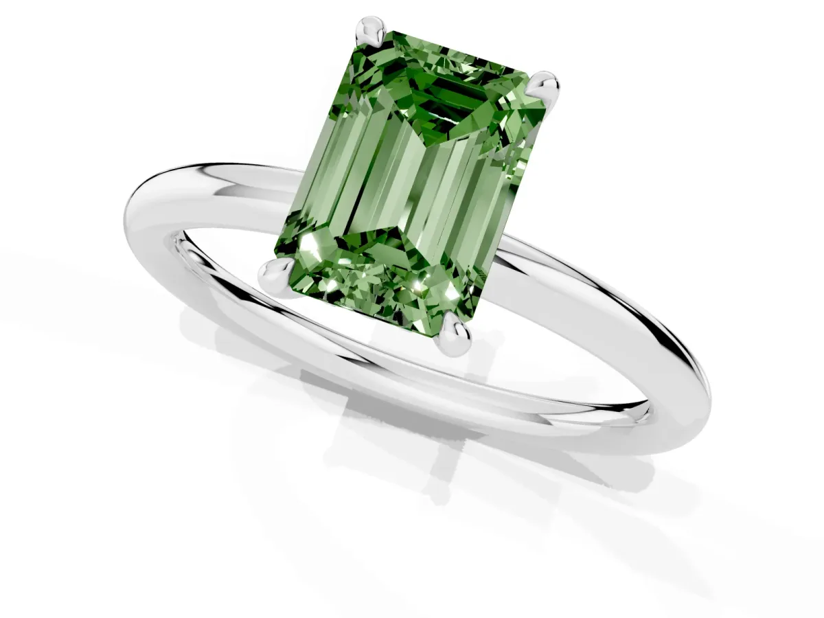 Fancy Green Emerald Cut Diamond Solitaire Ring with Thin Band and Four-Prong Setting Silver