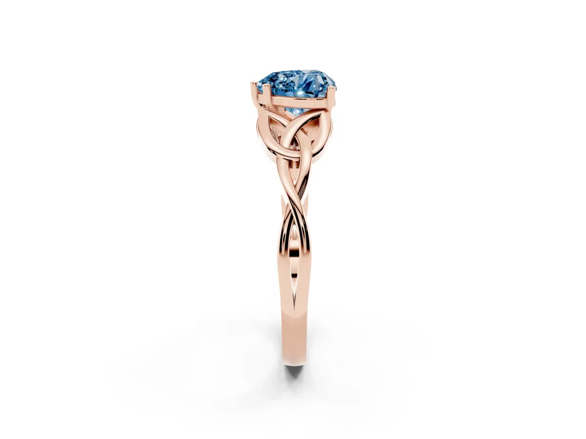 Fancy Blue Heart Cut Diamond Solitaire Engagement Ring with Celtic Knot Band and Four-Prong Setting Rose gold