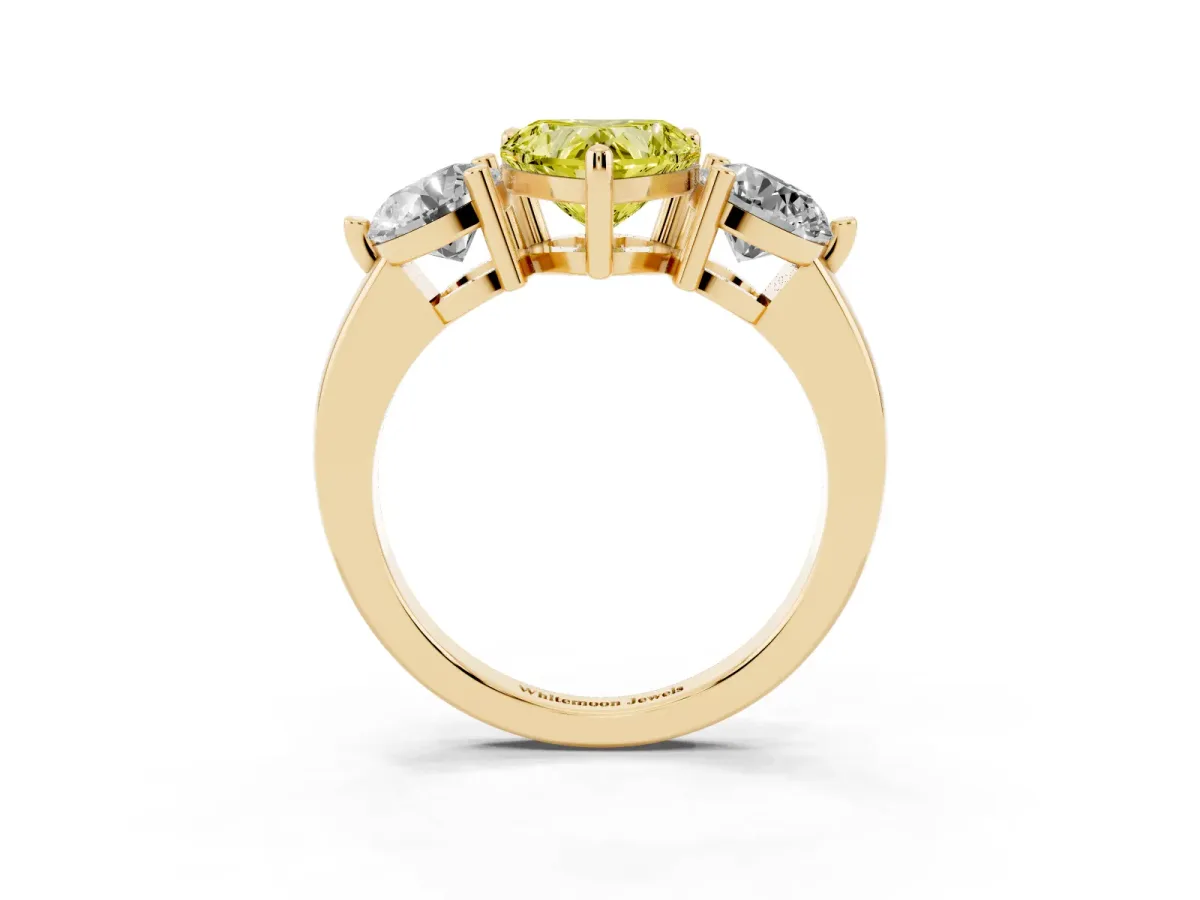 Fancy Yellow Three-Stone Heart Cut Brilliant Cut Solitaire Ring with Prong Setting on a Classic Band Yellow gold