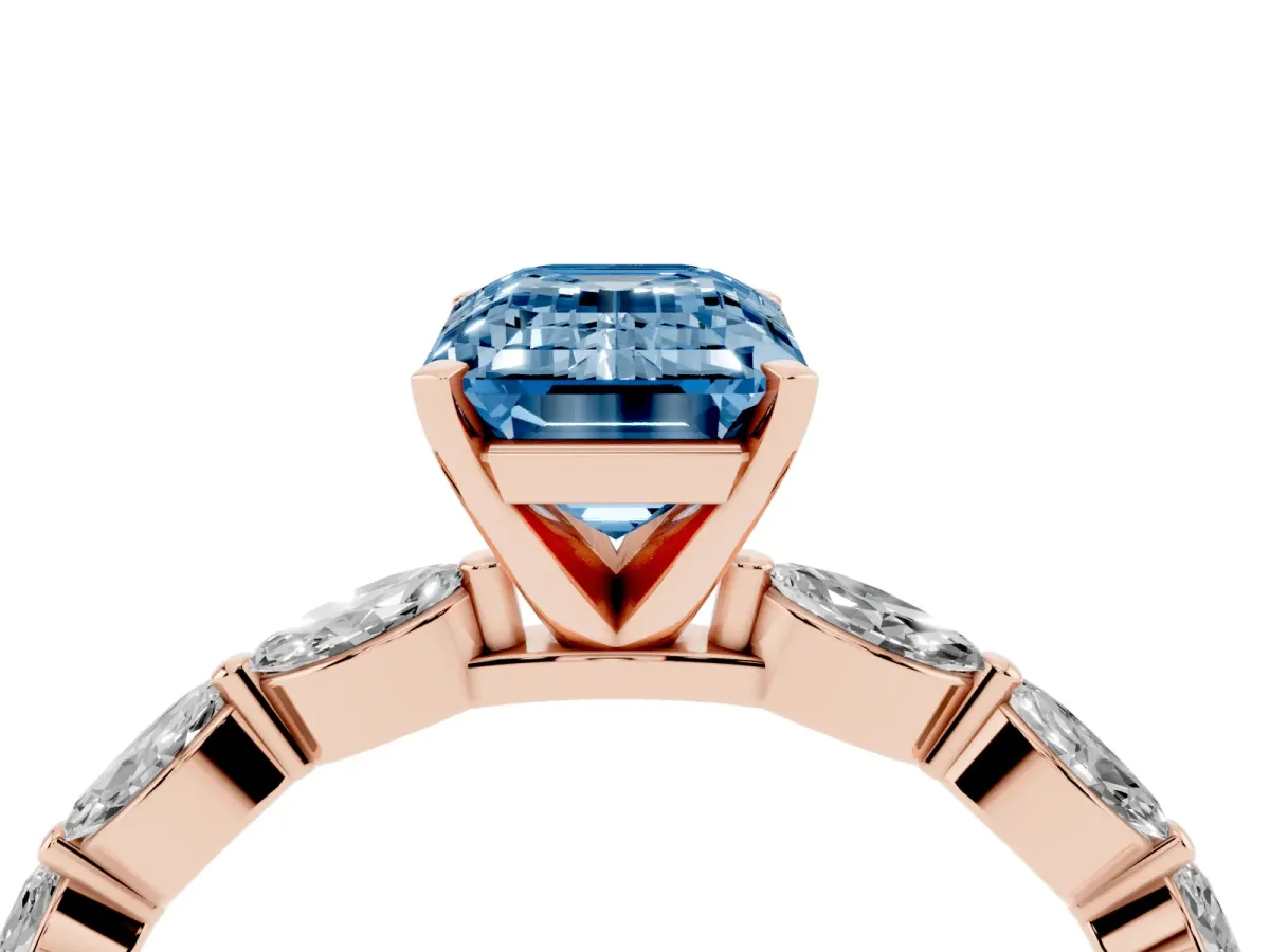 Fancy Blue Emerald Cut Diamond Ring with Marquise Side Stones and Prong Setting Rose gold