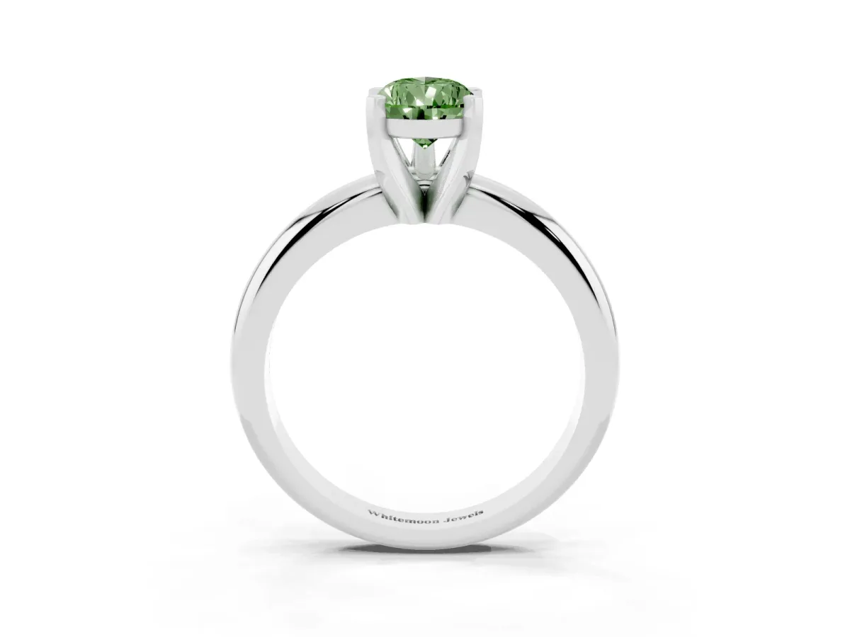 Fancy Green Pear Cut Diamond Solitaire Engagement Ring with Round Band and Four-Prong Setting Platinum