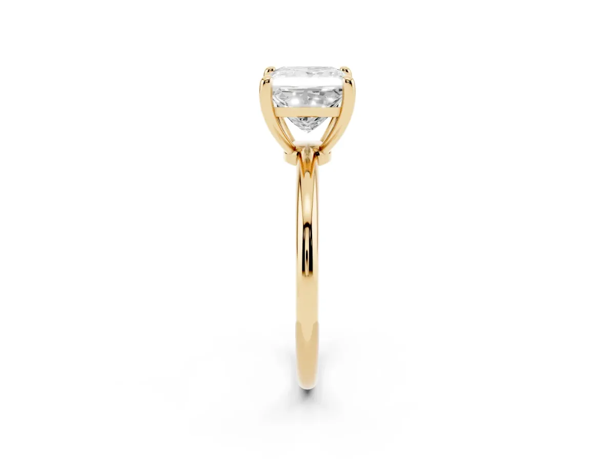 Princess Cut Solitaire Diamond Ring with 4-Prong Setting on a Classic Band Yellow gold