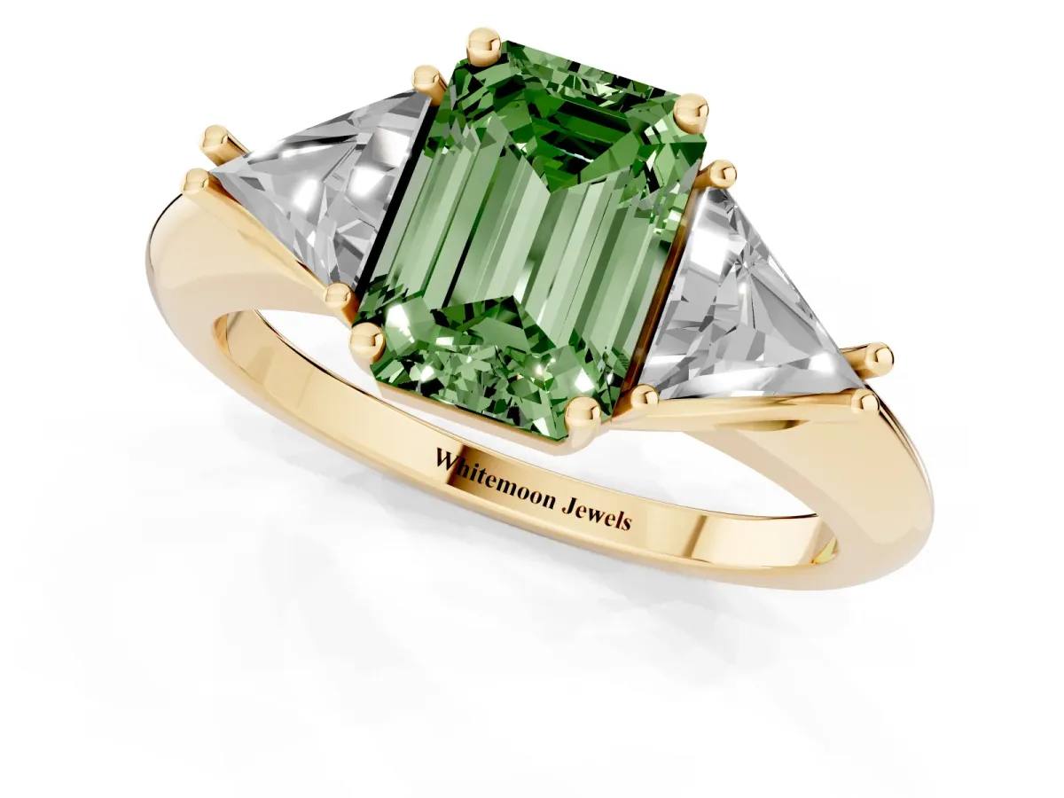 Fancy Green Three-Stone Emerald Cut Diamond Engagement Ring with Trillion Side Stones and Prong Setting Yellow gold