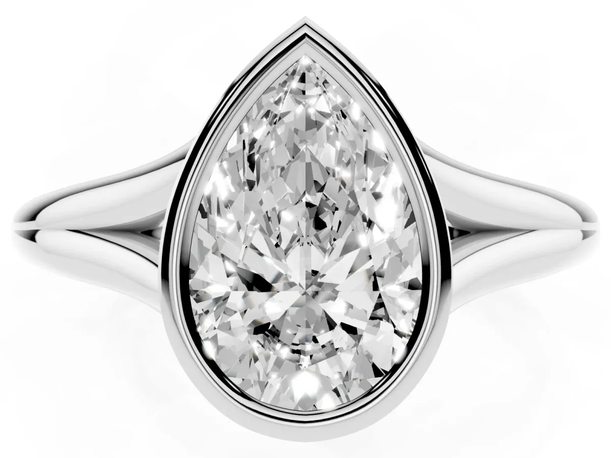 Bezel Set Pear Cut Cut Solitaire Ring with Tapered Band Platinum