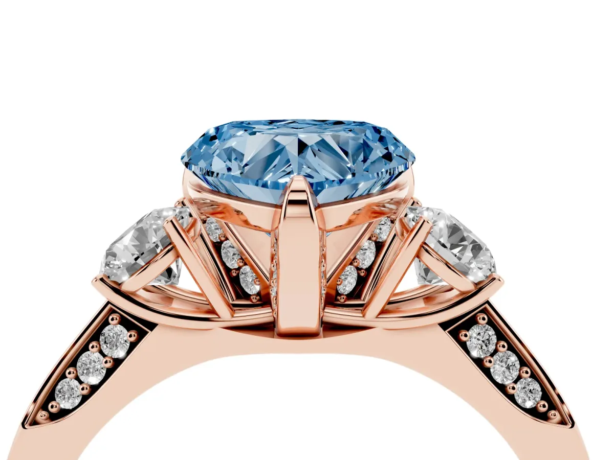 Fancy Blue Heart Cut Brilliant Three-Stone Diamond Ring with Pavé Band and Four-Prong Setting Rose gold