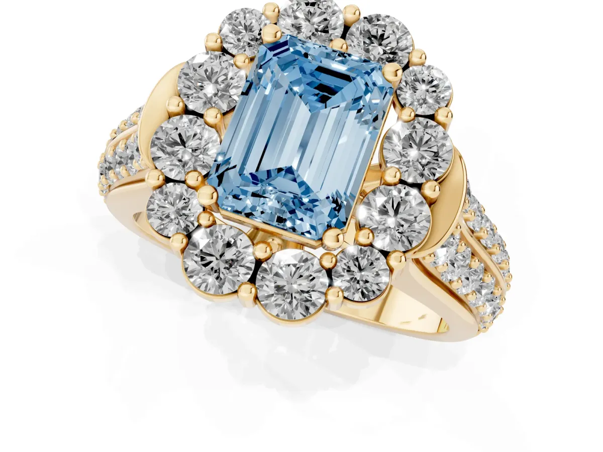 Fancy Blue Emerald Cut Halo Diamond Engagement Ring with Split Shank and Prong Setting Yellow gold