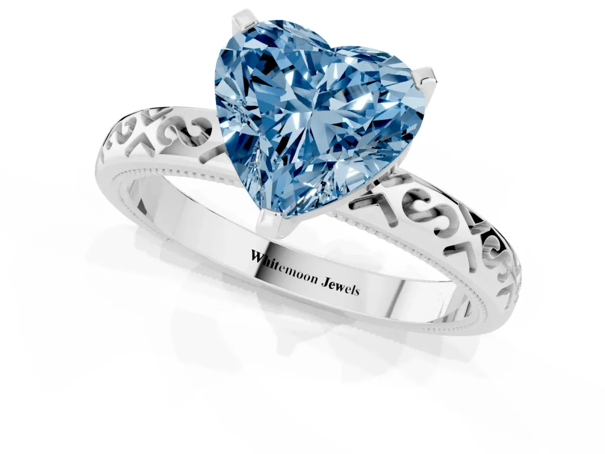 Fancy Blue Heart Cut Solitaire Engagement Ring with Scrollwork Band and Four-Prong Setting White gold