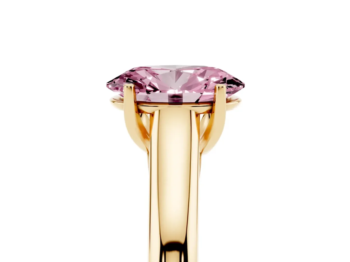 Fancy Pink Oval Cut Solitaire Engagement Ring with Tapered Band and Four-Prong Setting Yellow gold