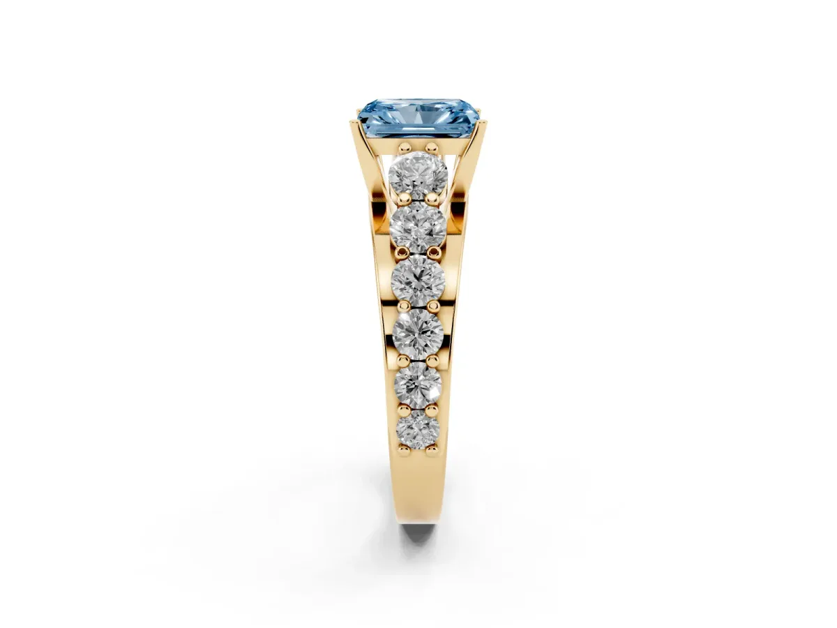 Fancy Blue Radiant Cut Diamond Engagement Ring with Pavé Band and Four-Prong Setting Yellow gold