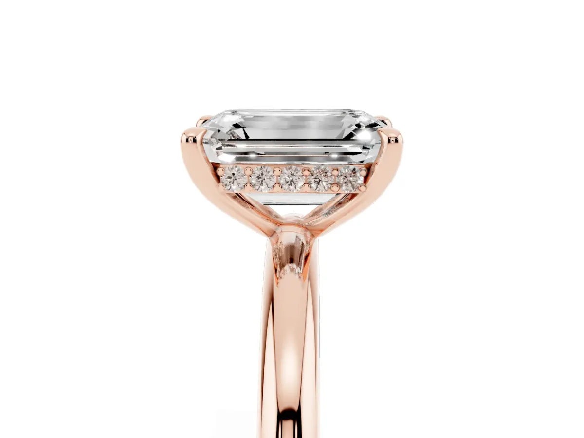 Emerald Cut Diamond Solitaire Ring with Thin Band and Four-Prong Setting Rose gold