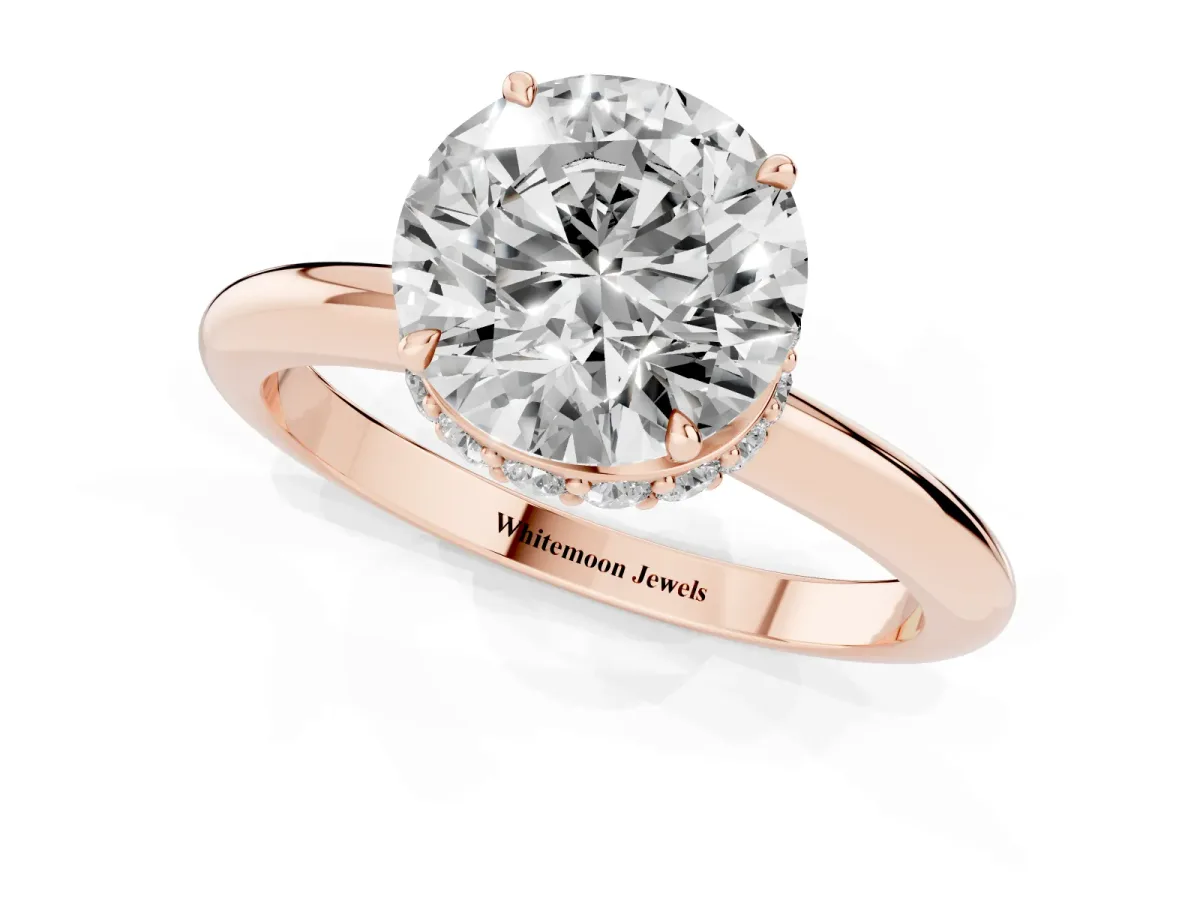 Round Cut Brilliant Solitaire Engagement Ring with Six-Prong Setting and Classic Band Rose gold