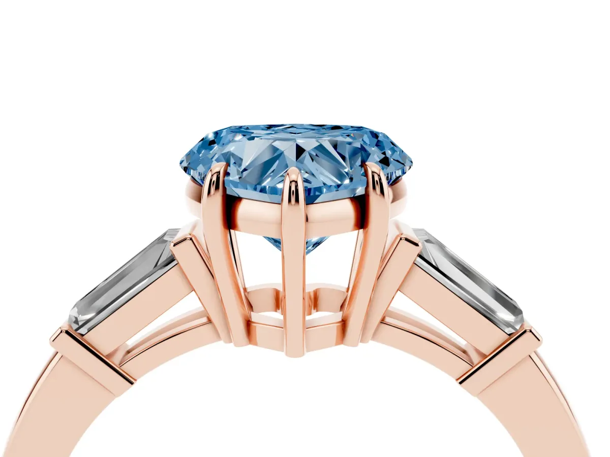 Fancy Blue Heart Cut Diamond Three-Stone Ring with Tapered Baguette Side Stones and Prong Setting Rose gold