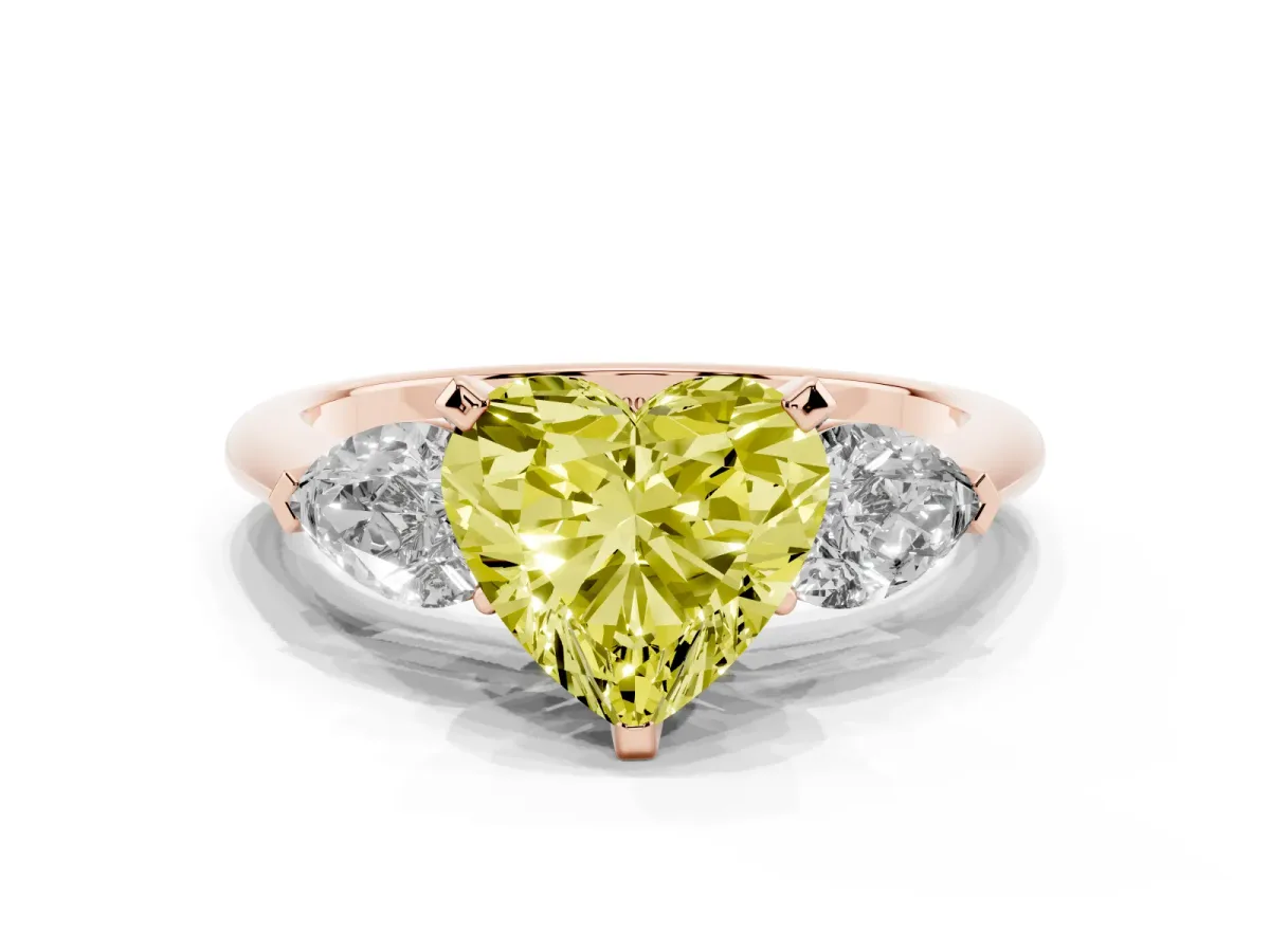 Fancy Yellow Three-Stone Heart Cut Diamond Ring with Pear Side Stones and Four-Prong Setting Rose gold