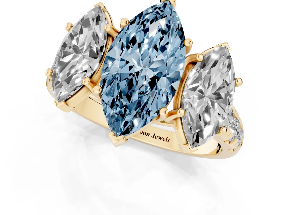 Fancy Blue Three-Stone Marquise Cut Diamond Pavé Band with Prong Setting Yellow gold
