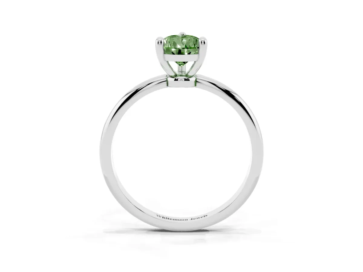 Fancy Green Pear Cut Solitaire Diamond Ring with 4-Prong Setting on a Classic Band Silver