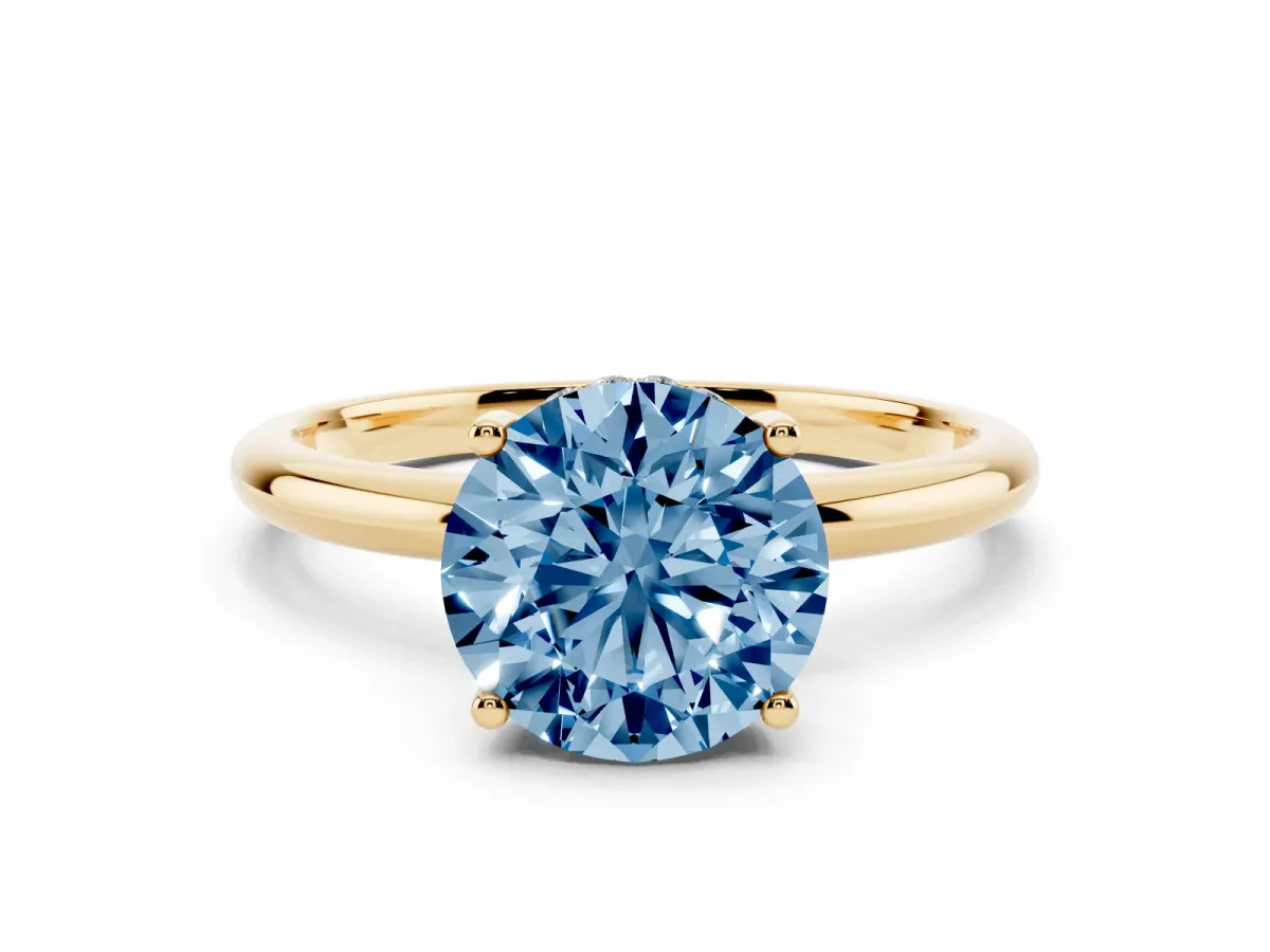 Fancy Blue Round Cut Cut Solitaire Engagement Ring with Four-Prong Setting and Classic Band Yellow gold