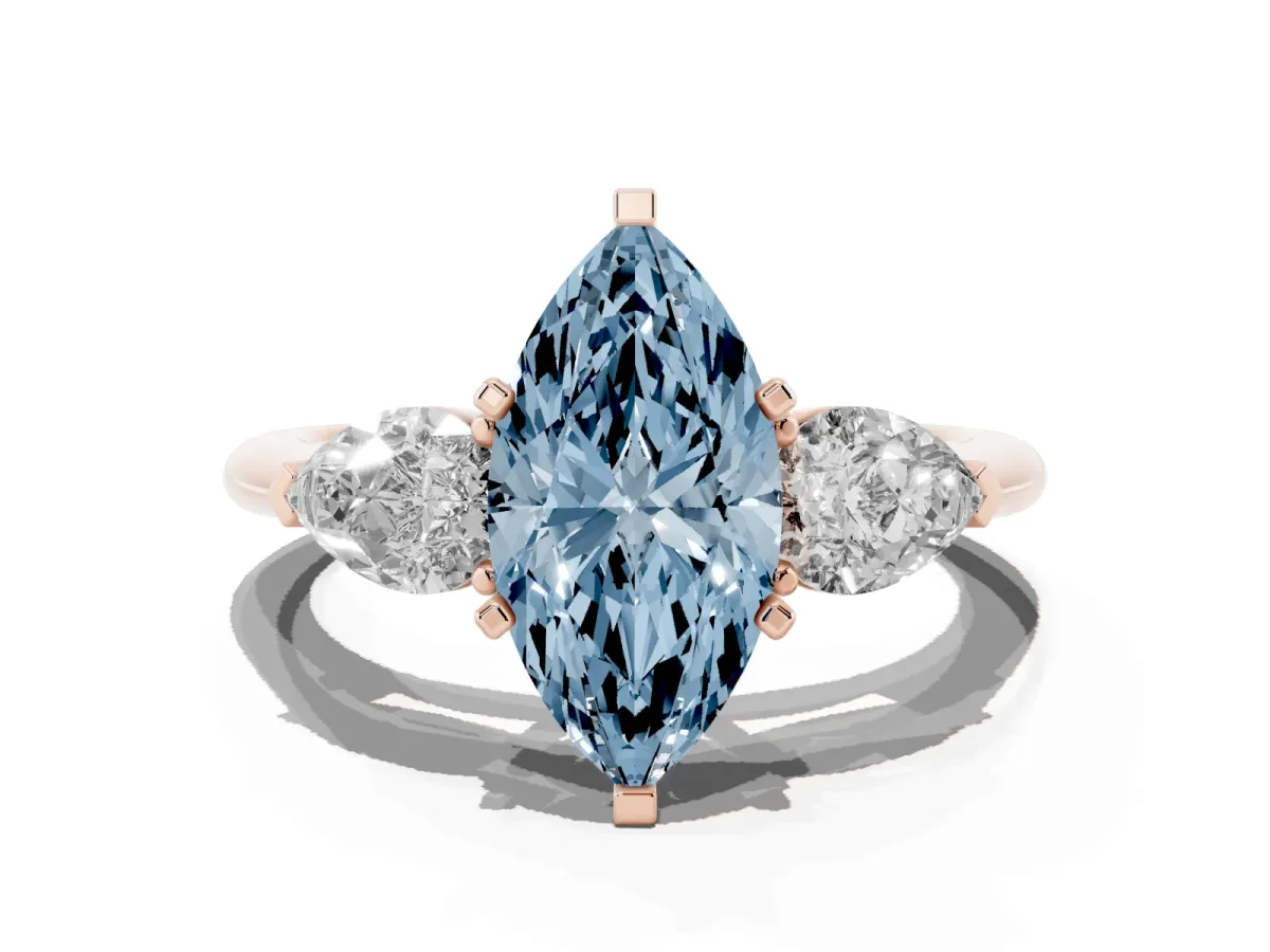 Fancy Blue Three-Stone Marquise Cut Diamond Ring with Pear Side Stones and Four-Prong Setting Rose gold