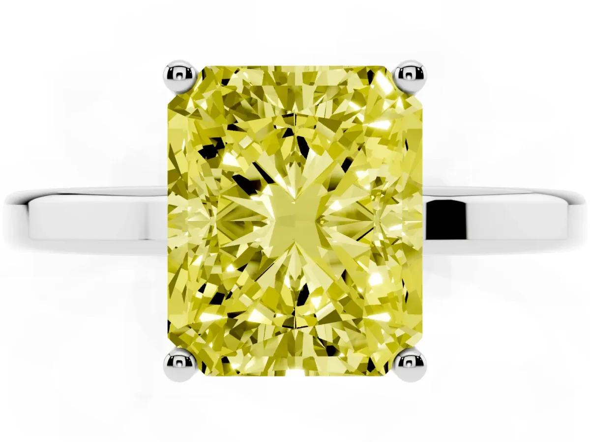 Fancy Yellow Radiant Cut Cut Solitaire Engagement Ring with Four-Prong Setting on a Classic Band Silver