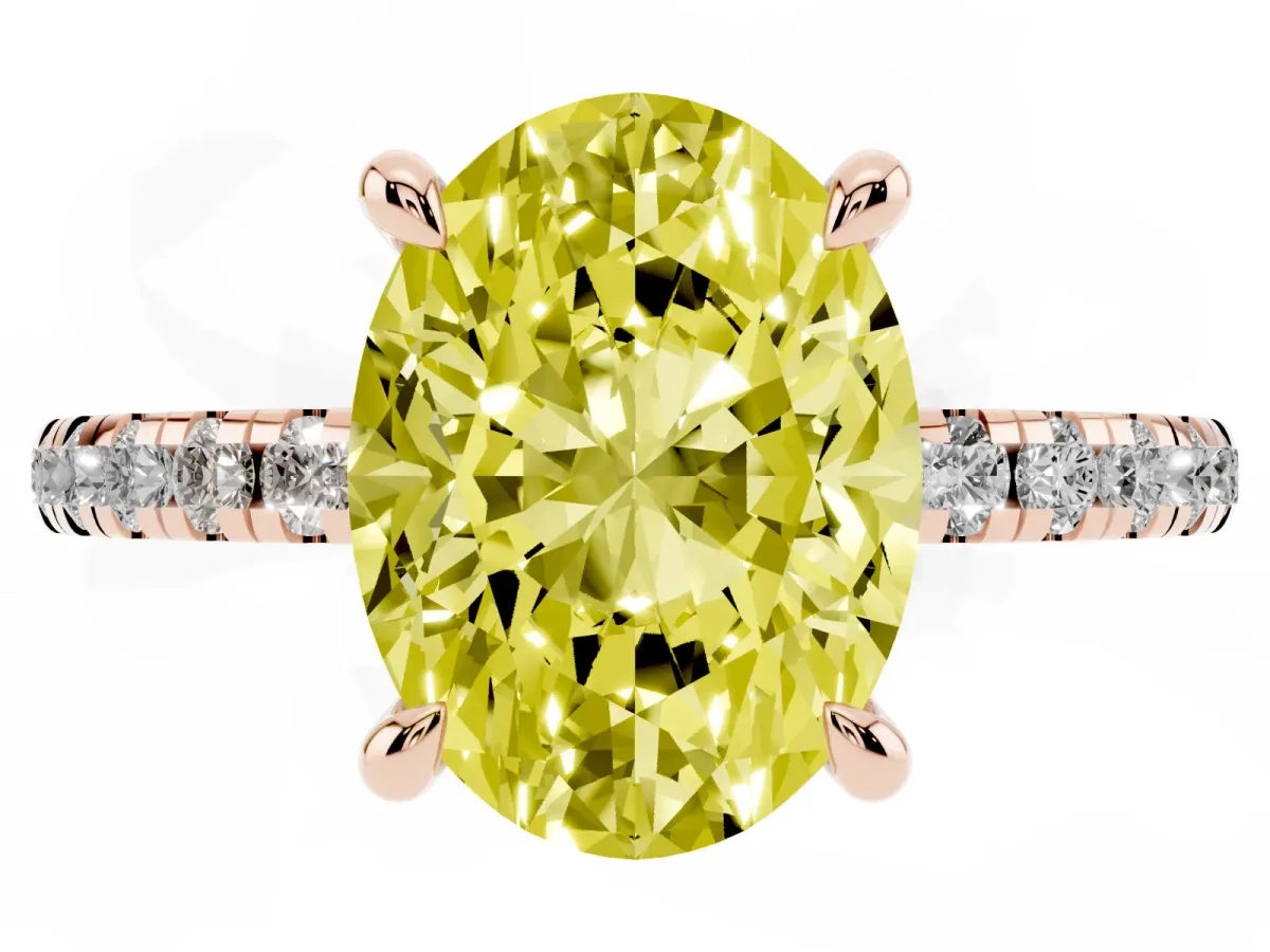 Fancy Yellow Oval Cut Diamond Brilliant Solitaire Ring with Pavé Band and Four-Prong Setting Rose gold