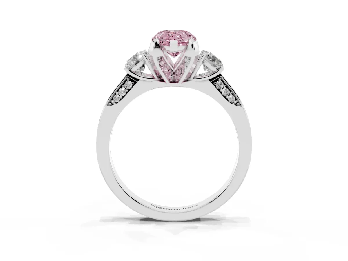 Fancy Pink Pear Cut Brilliant Three-Stone Diamond Ring with Pavé Band and Four-Prong Setting Silver
