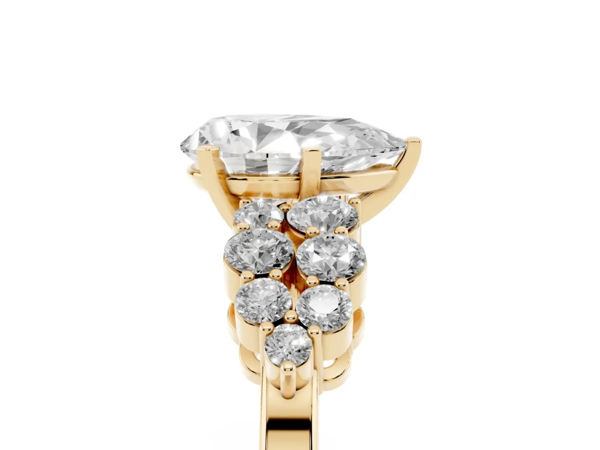 Pear Cut Cluster Diamond Engagement Ring with Pavé Band and Four-Prong Setting Yellow gold