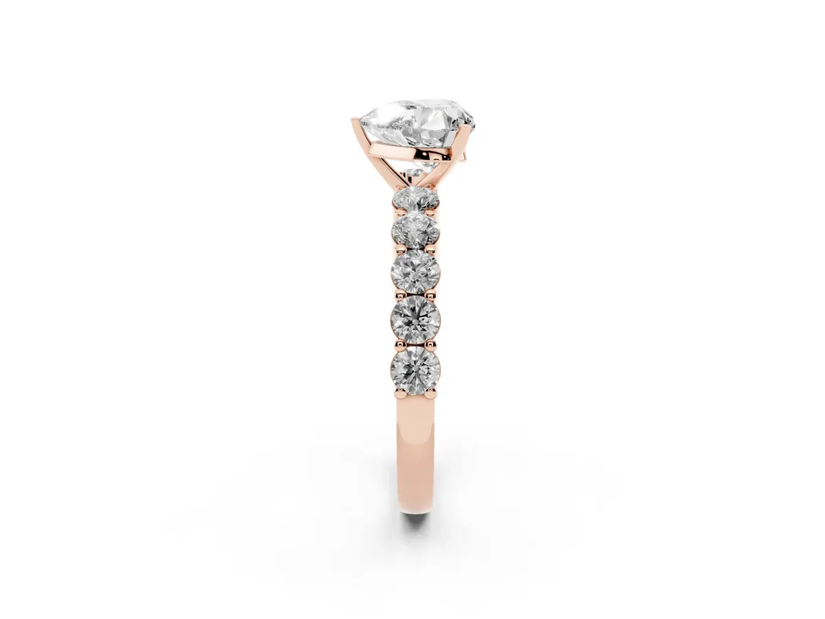Heart Cut Diamond Solitaire Ring with Shared Prong Round Side Stones Rose gold
