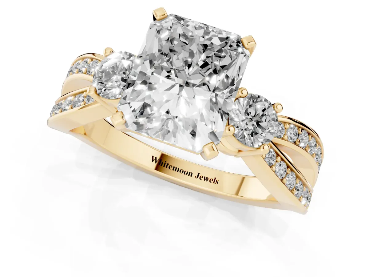 Three-Stone Radiant Cut Cut Diamond Twist Band with Prong Setting Yellow gold
