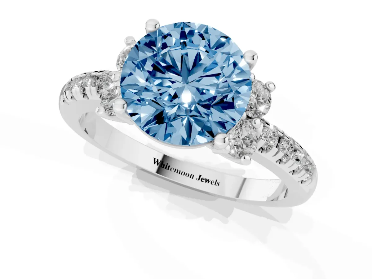 Fancy Blue Round Cut Diamond Three-Stone Pave Band with Four-Prong Setting Platinum