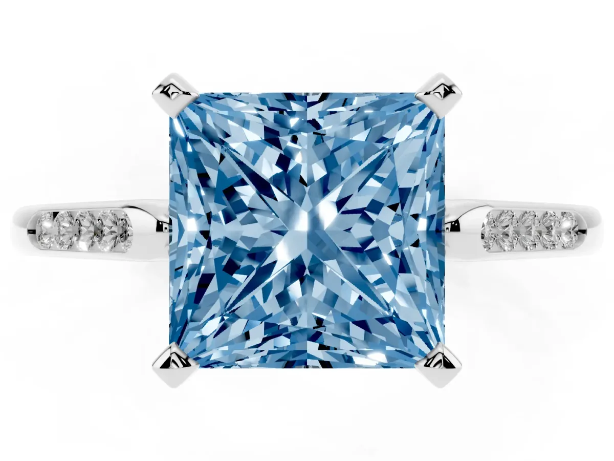 Fancy Blue Princess Cut Diamond Solitaire Ring with Channel Set Round Band and Prong Setting Silver