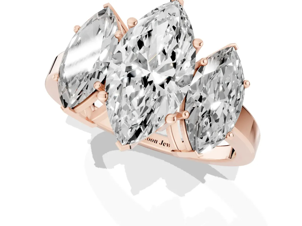 Three-Stone Marquise Cut Cut Diamond Engagement Ring with Flat Band and Four-Prong Setting Rose gold