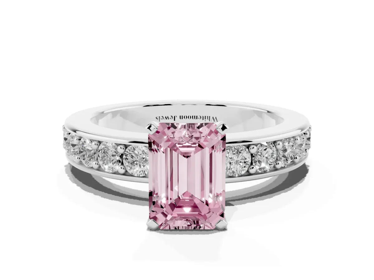 Fancy Pink Emerald Cut Diamond Engagement Ring with Channel Set Round Band and Prong Setting Platinum