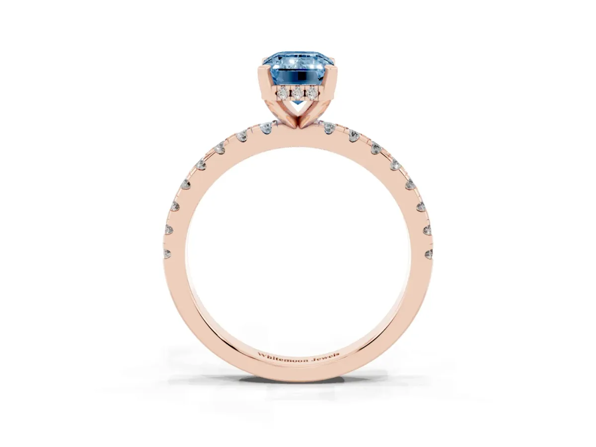 Fancy Blue Emerald Cut Diamond Solitaire Ring with Round Pavé Band and Four-Prong Setting Rose gold