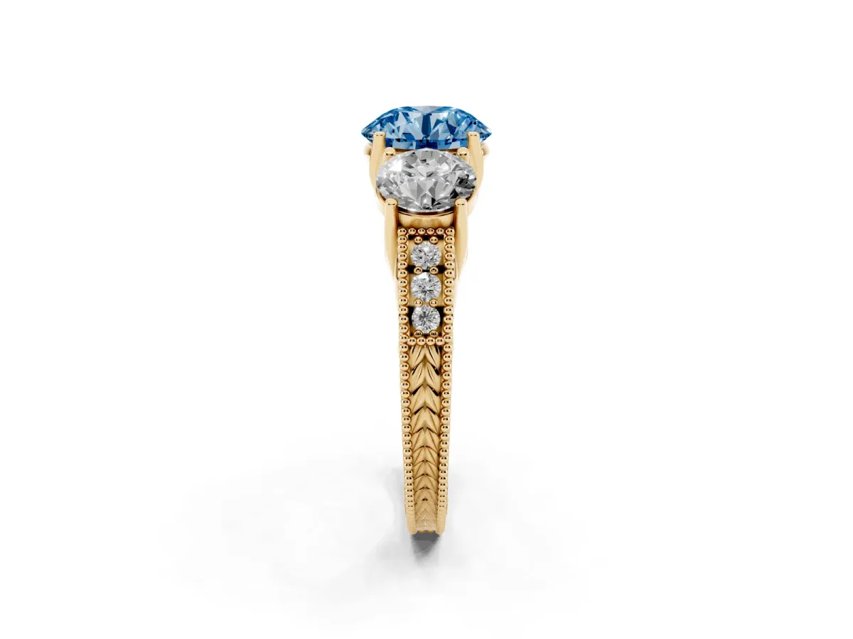 Fancy Blue Three-Stone Round Cut Cut Milgrain Pavé Engagement Ring Yellow gold