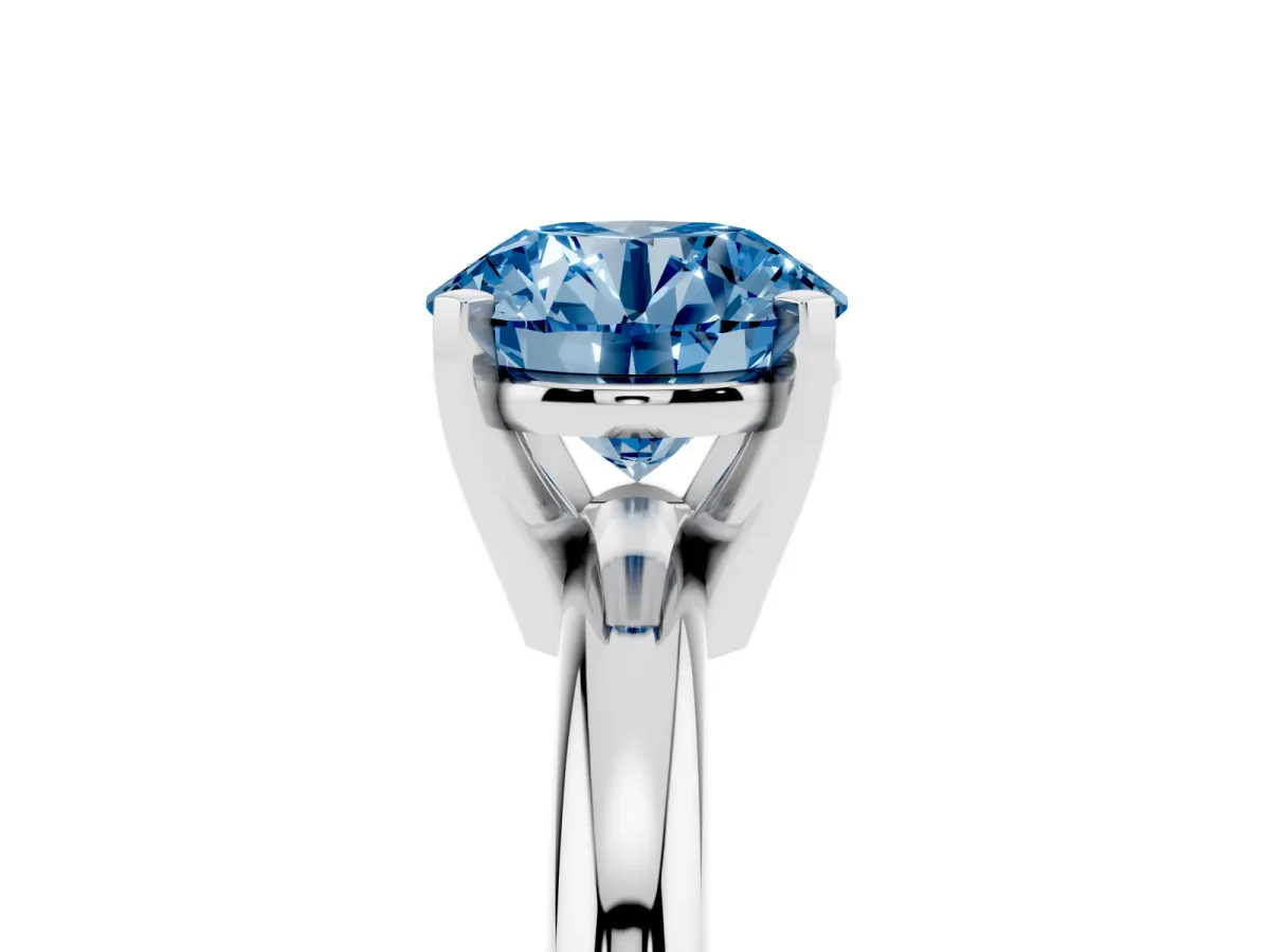Fancy Blue Round Cut Diamond Solitaire Engagement Ring with Round Band and Four-Prong Setting Silver