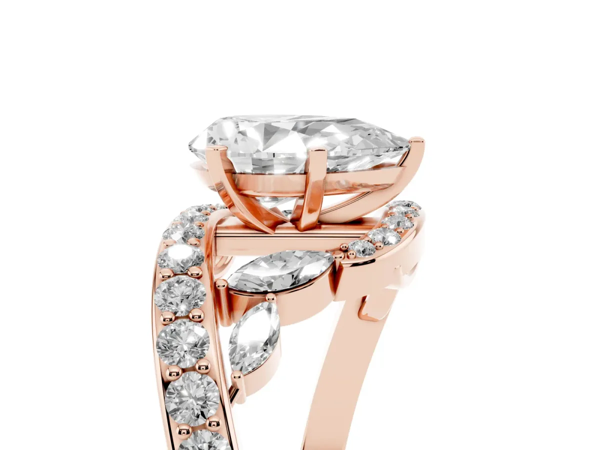 Pear Cut Solitaire with Pavé Twist Band and Four-Prong Setting Rose gold