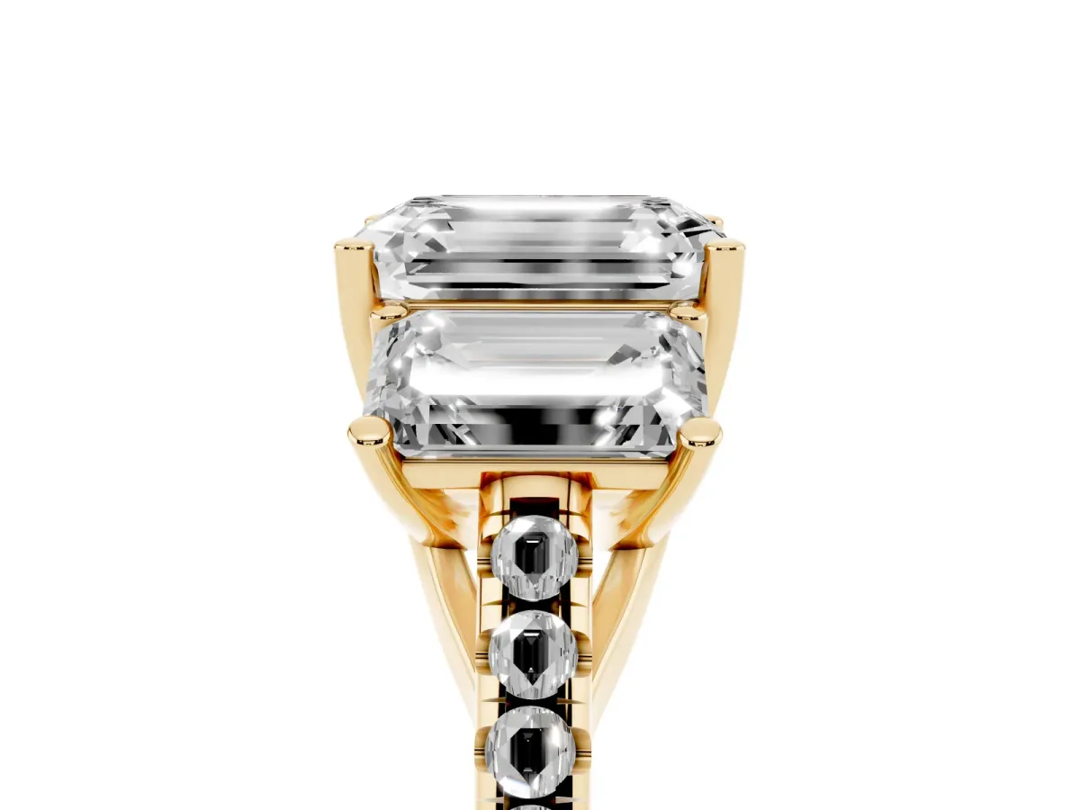 Three-Stone Emerald Cut Diamond Ring with Round Pavé Band and Prong Setting Yellow gold
