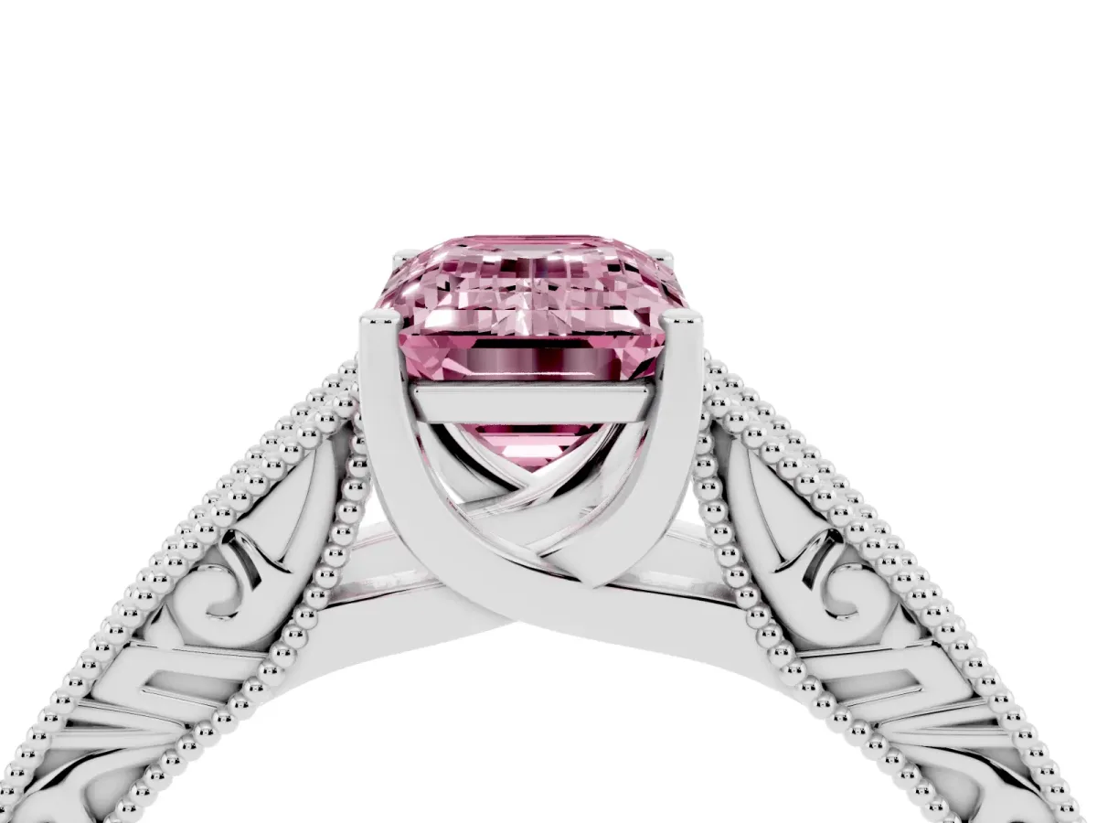 Fancy Pink Emerald Cut Diamond Solitaire Ring with Engraved Band and Four-Prong Setting Platinum