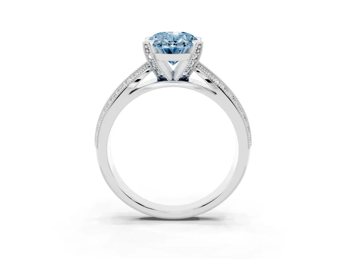 Fancy Blue Oval Cut Diamond Solitaire Ring with Milgrain Round Pavé Band and Prong Setting Silver