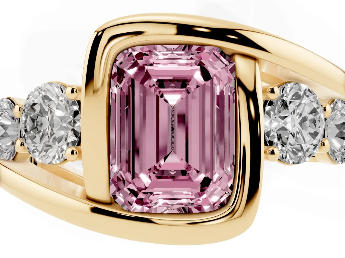 Fancy Pink Bezel Set Emerald Cut Diamond Bypass Ring with Round Accents Yellow gold