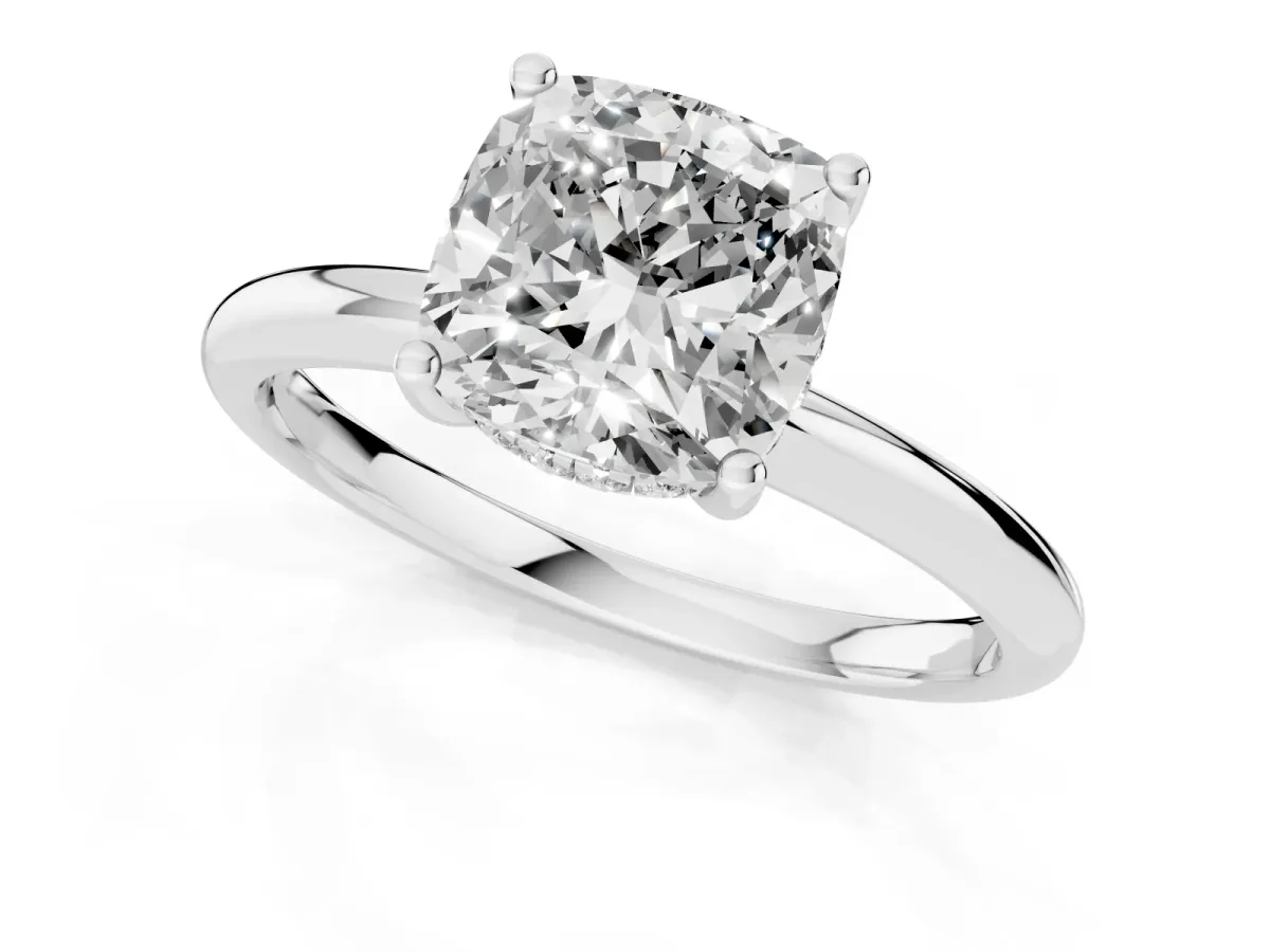 Cushion Cut Cut Solitaire Engagement Ring with Four-Prong Setting and Classic Band Silver
