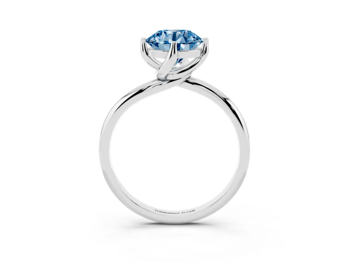 Fancy Blue Round Cut Diamond Solitaire Engagement Ring with Four-Prong Setting and Classic Band Silver